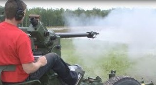 Firing A 40mm Machine Gun